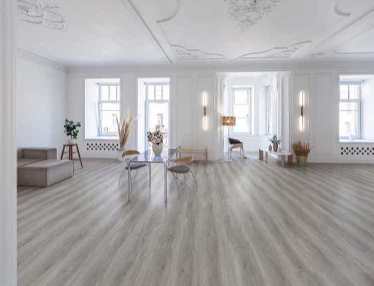 Dry back glue-down vinyl plank flooring installed in a modern interior